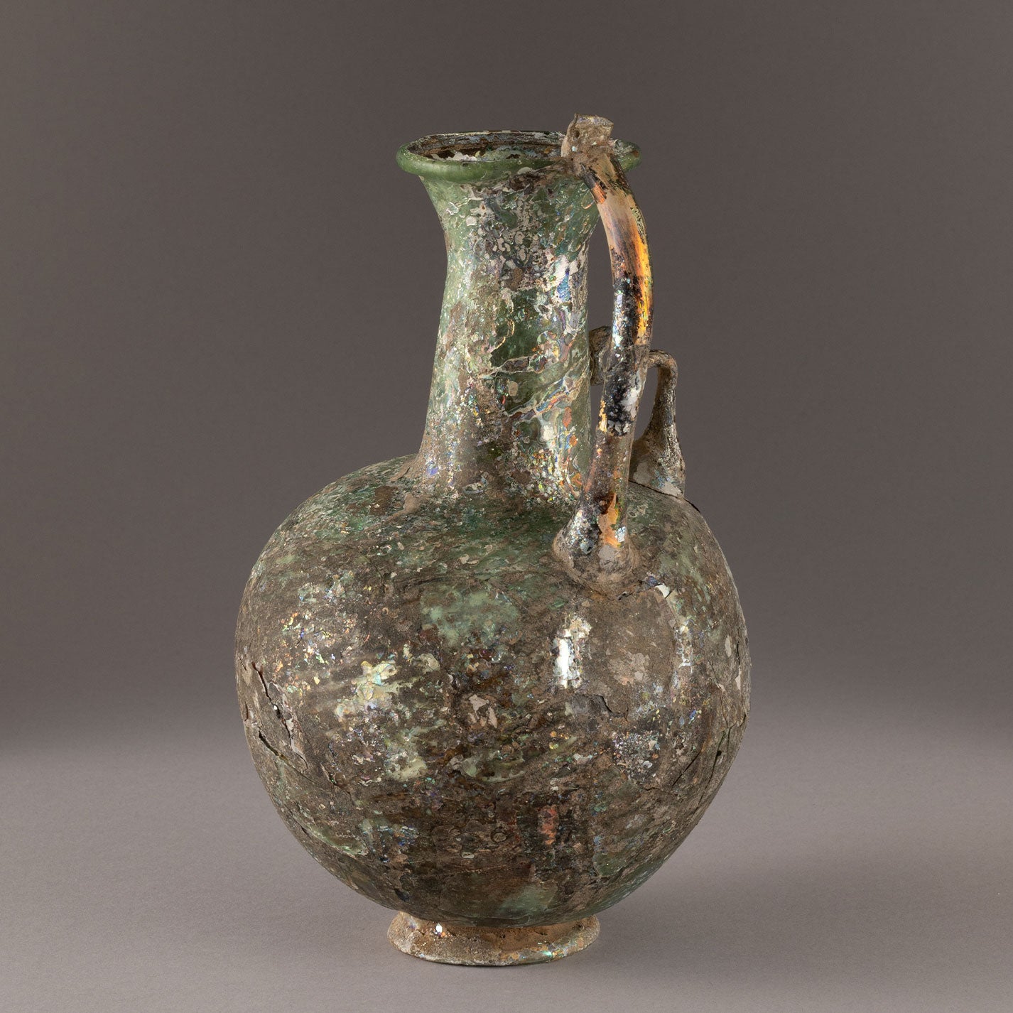 Roman glass handled ewer