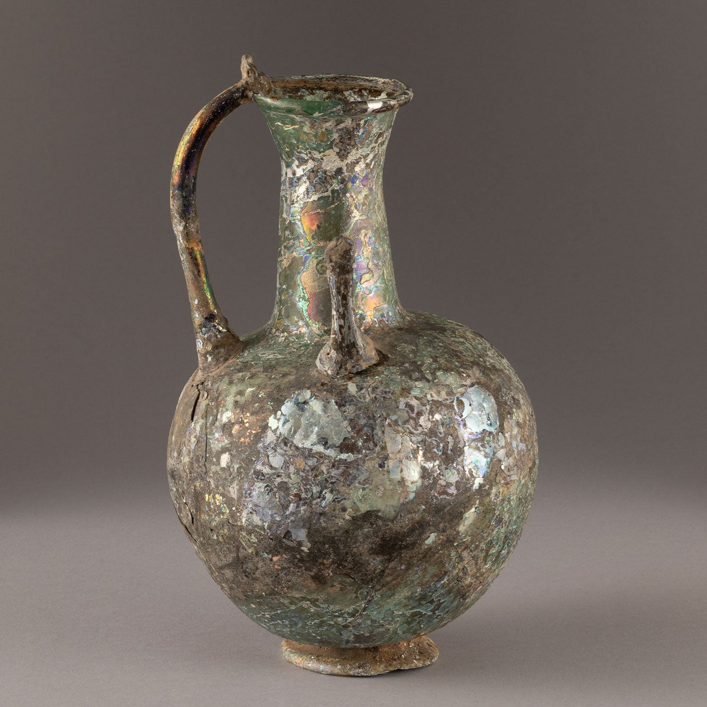 Roman glass handled ewer
