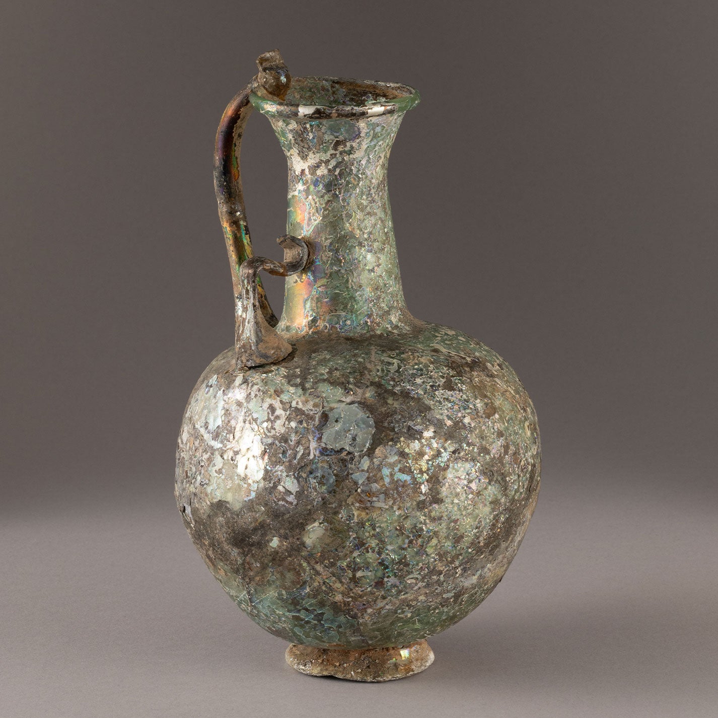 Roman glass handled ewer