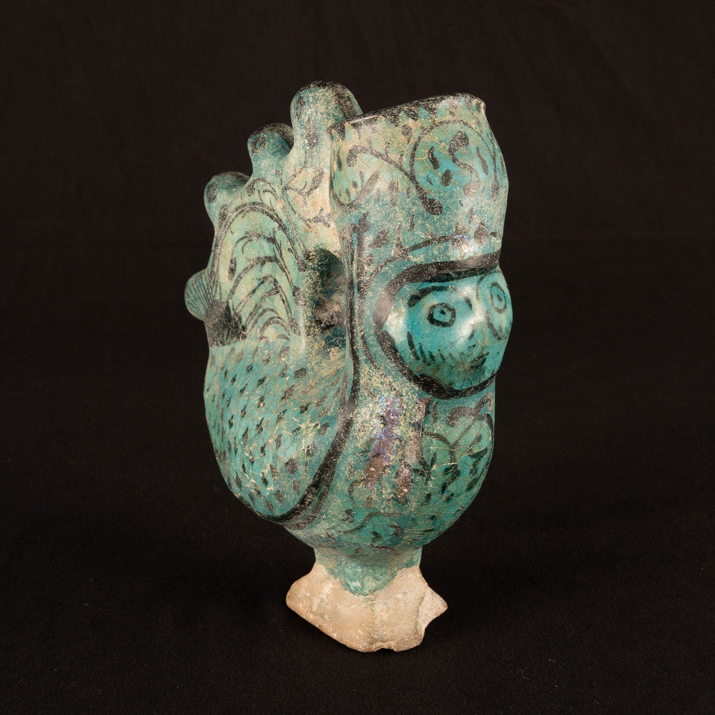 Persia "Blue glazed, silvered, Bird type pitcher"