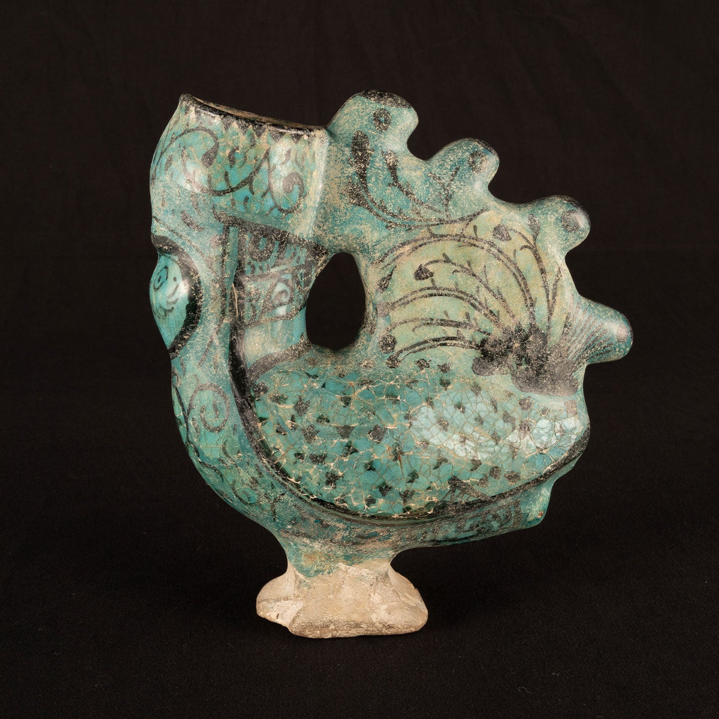 Persia "Blue glazed, silvered, Bird type pitcher"