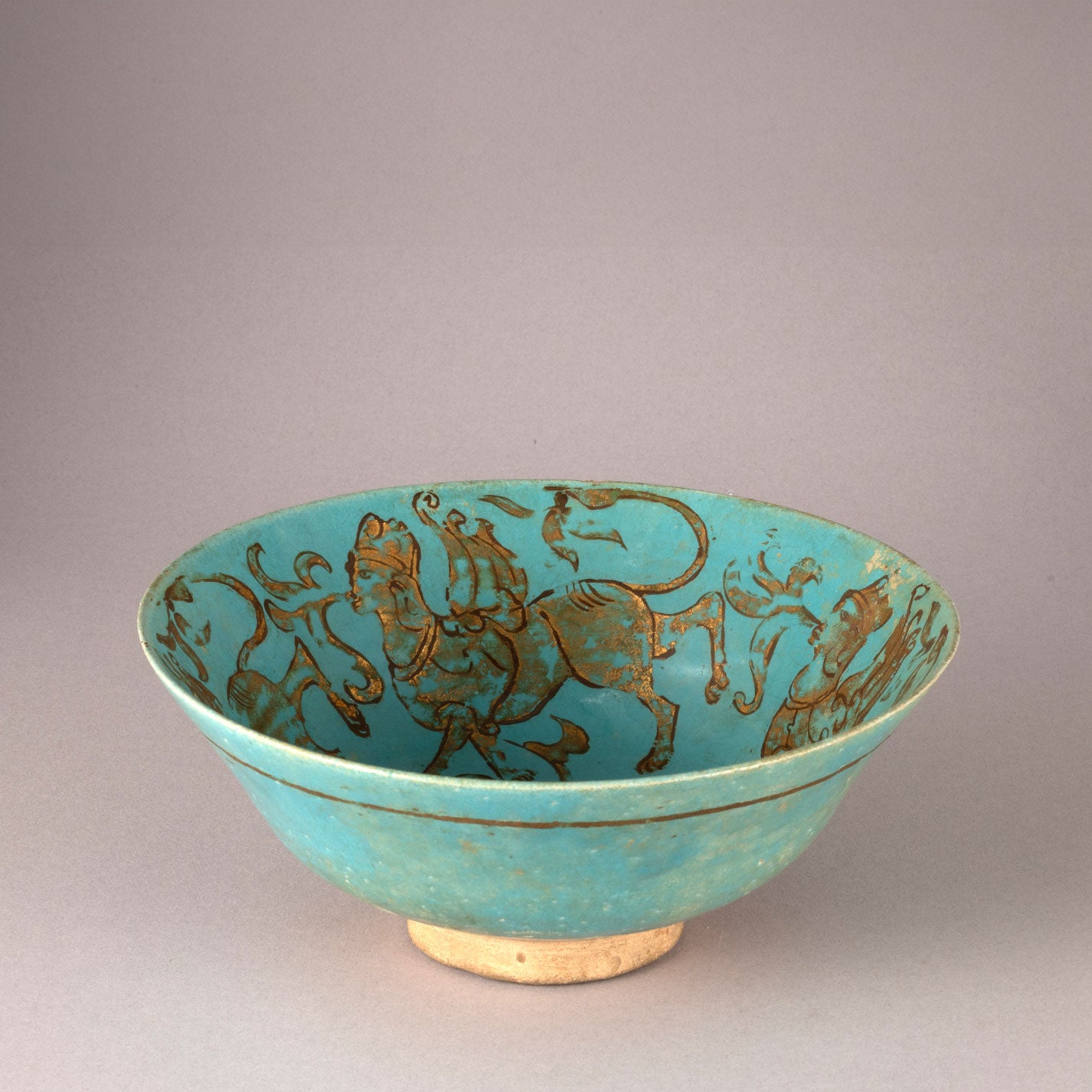 Kashan "Blue glazed with Gilt monster design bowl"