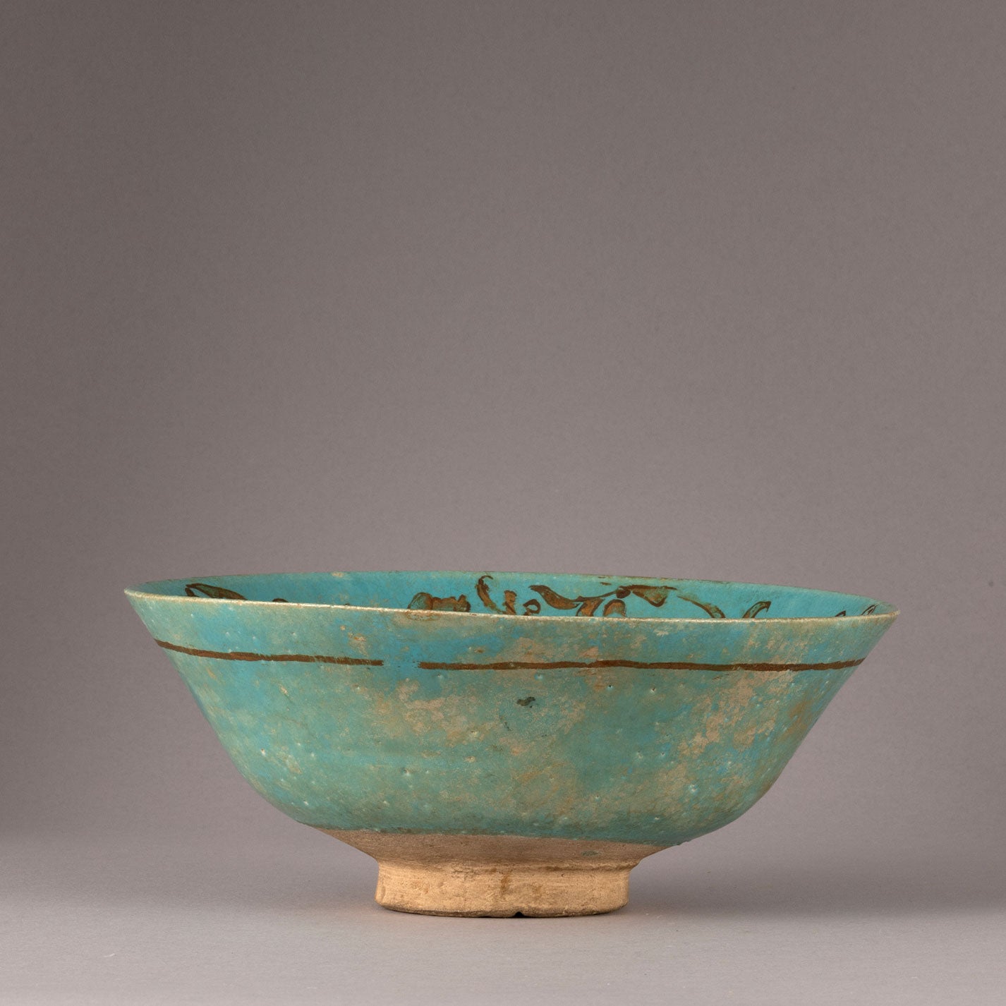 Kashan "Blue glazed with Gilt monster design bowl"