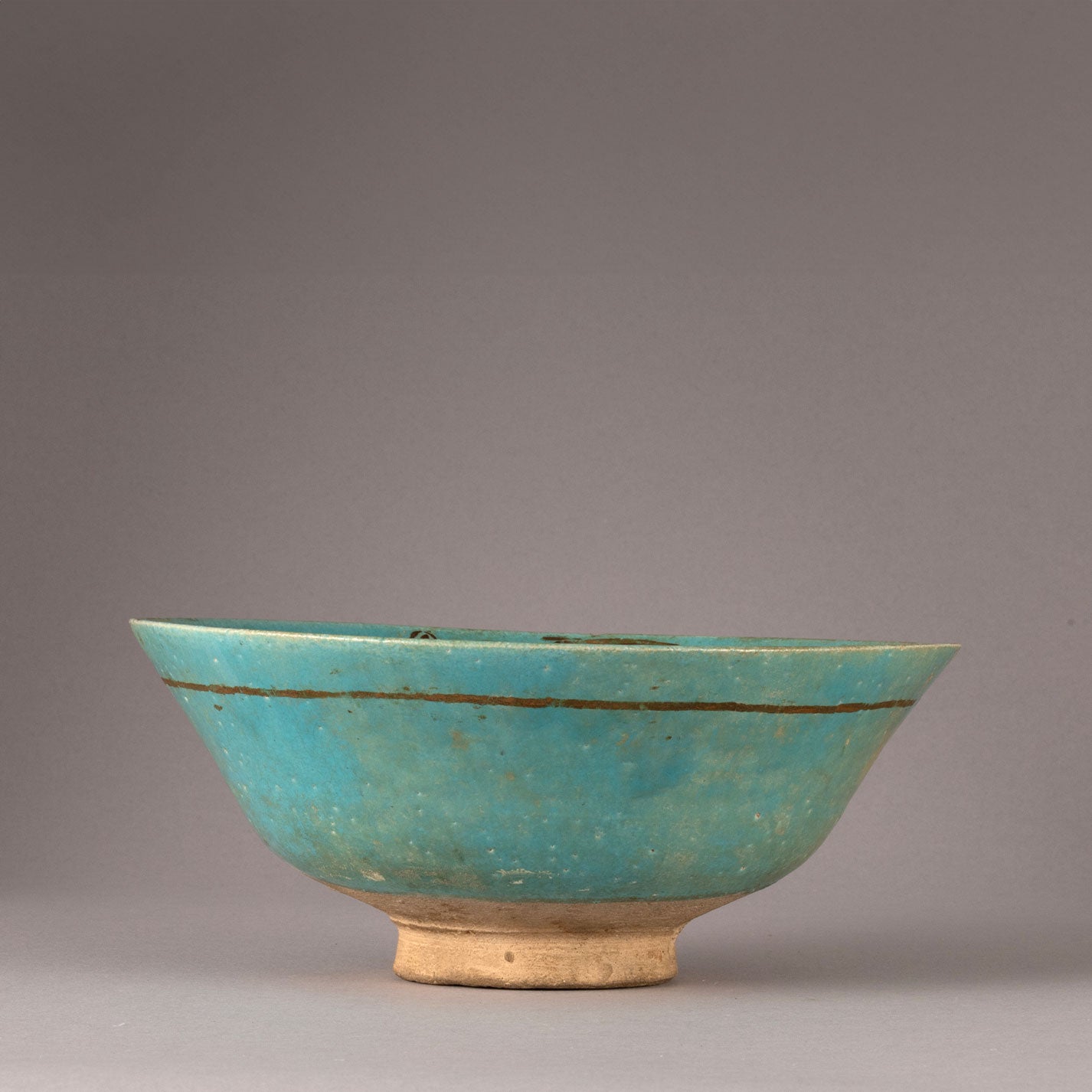 Kashan "Blue glazed with Gilt monster design bowl"