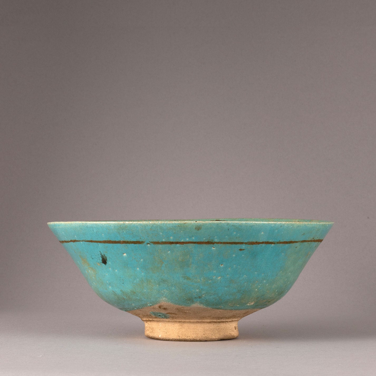 Kashan "Blue glazed with Gilt monster design bowl"