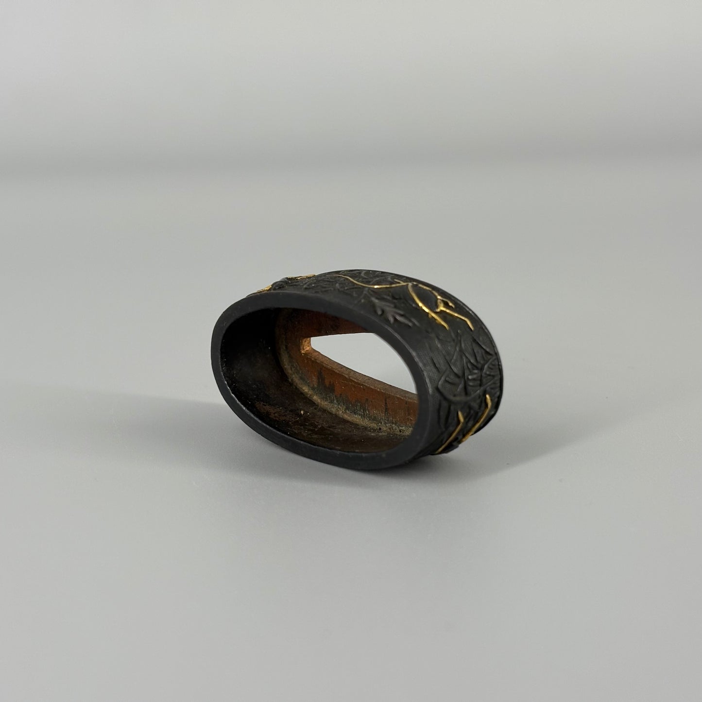 Bird and insect motif sword fittings