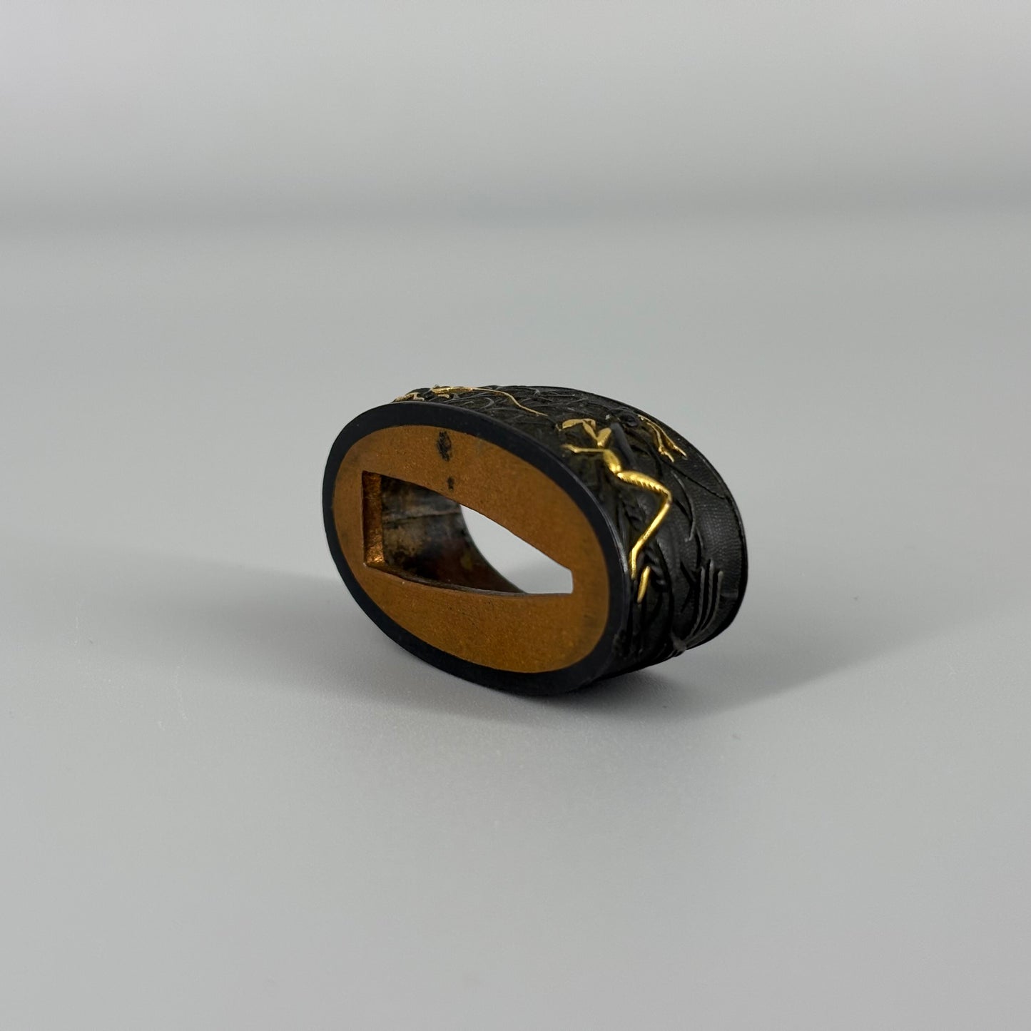 Bird and insect motif sword fittings