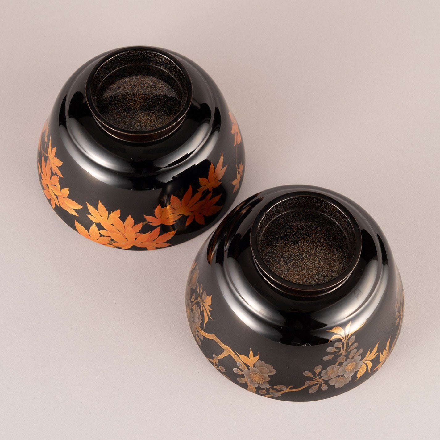 A pair of Makie sake cup washers