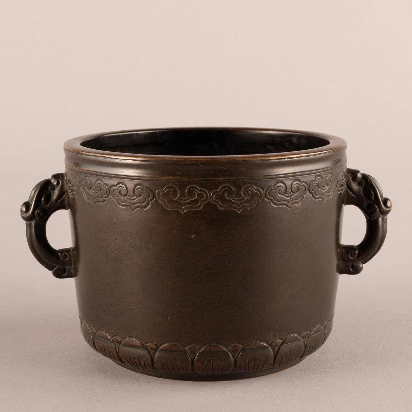 Cast bronze lotus flower and animal ear hearth