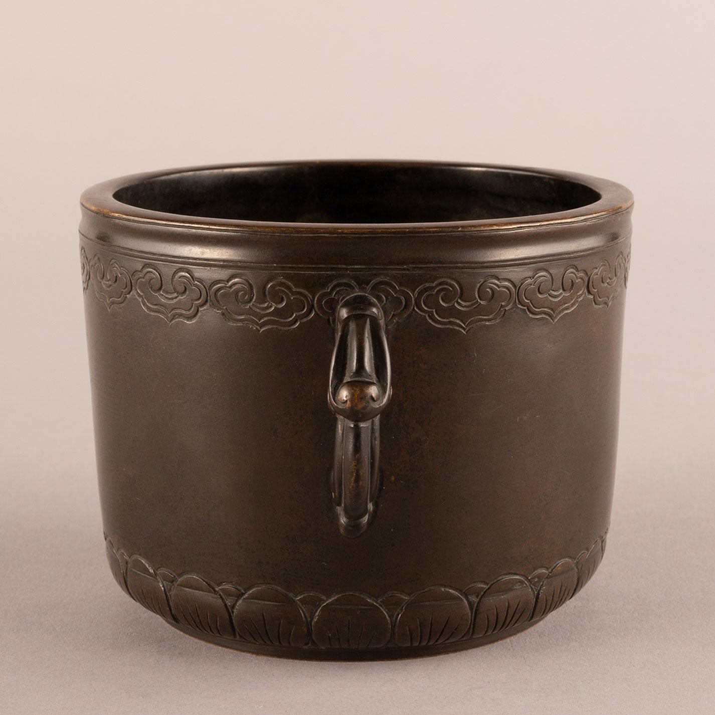 Cast bronze lotus flower and animal ear hearth