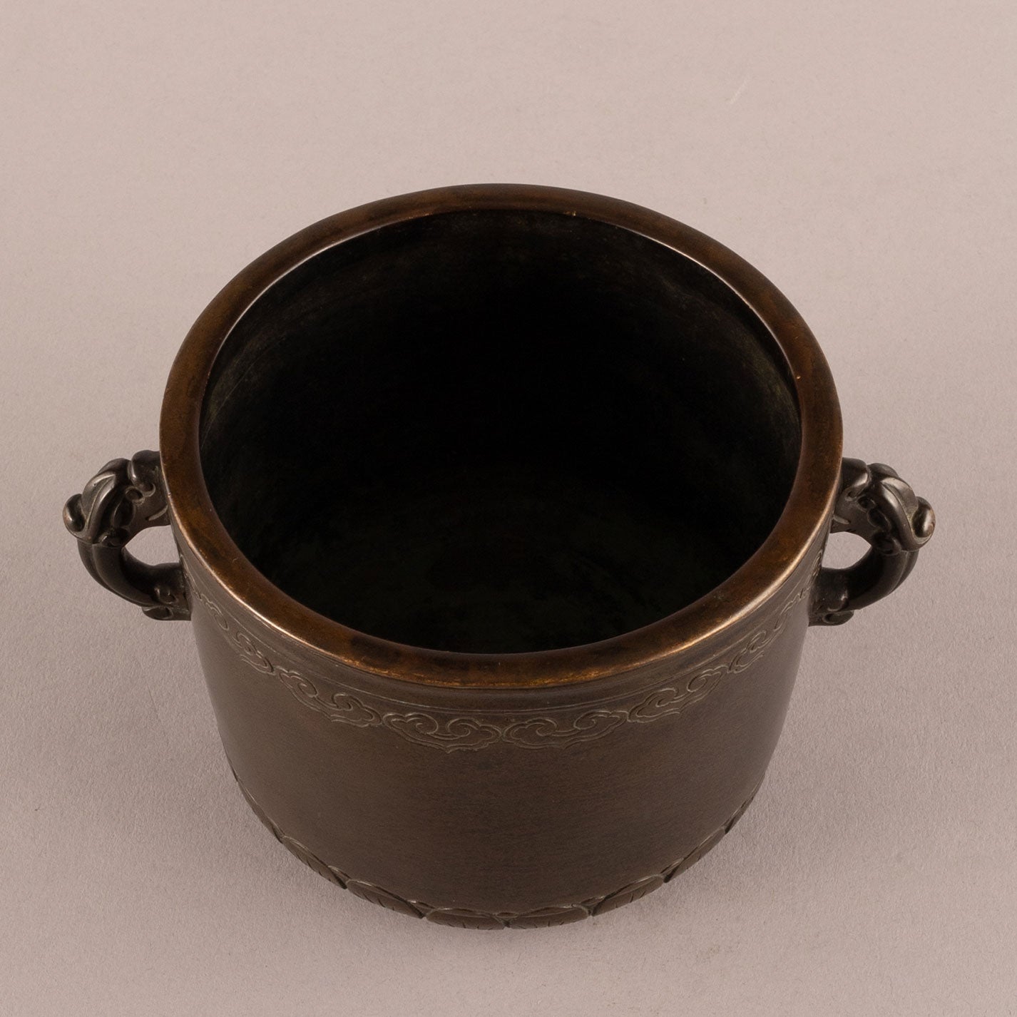 Cast bronze lotus flower and animal ear hearth