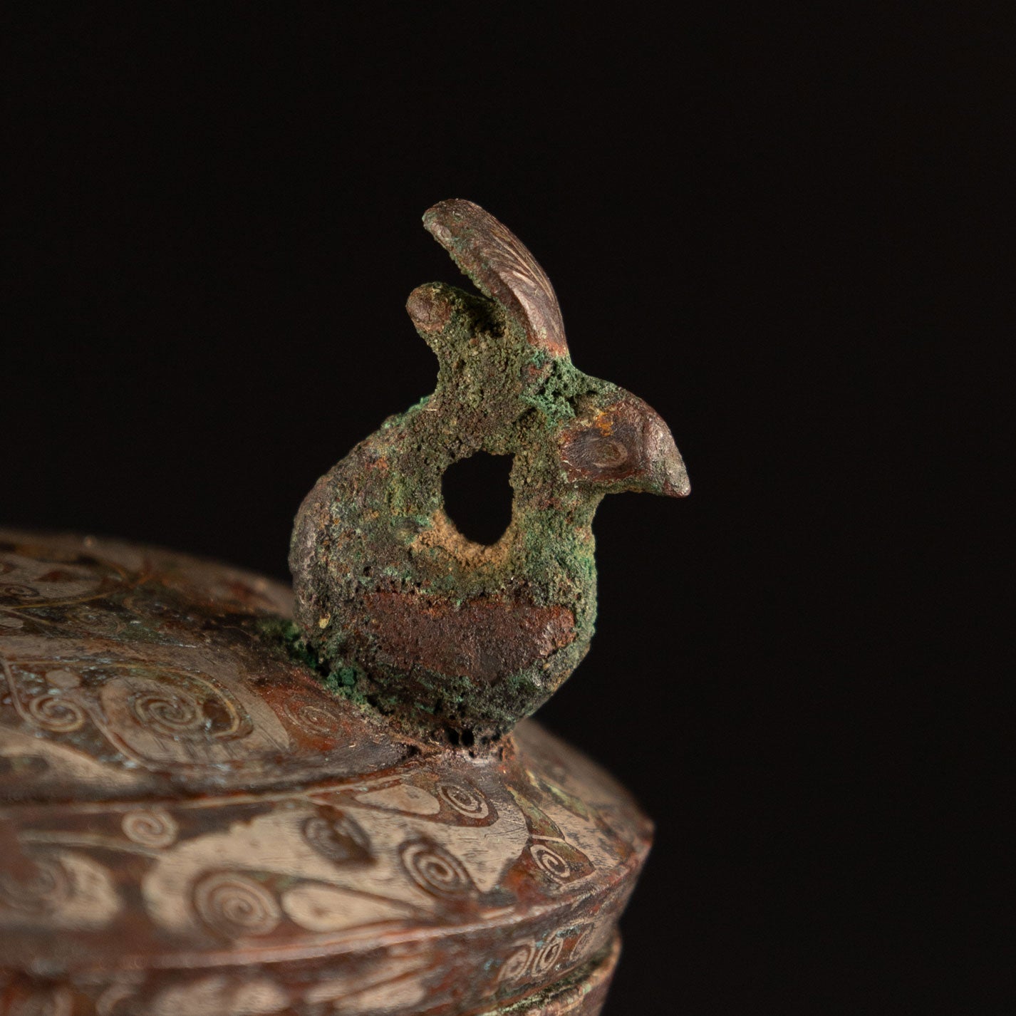 Copper-inlaid silver jar with a beast's face