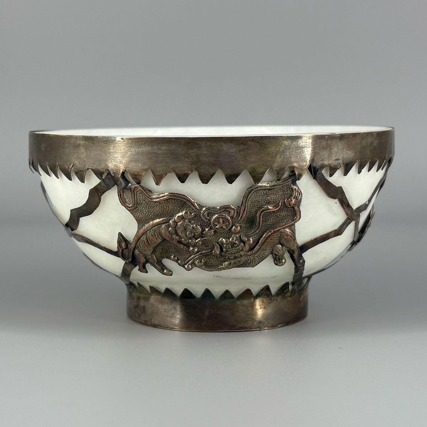 White jade bowl with brass decoration