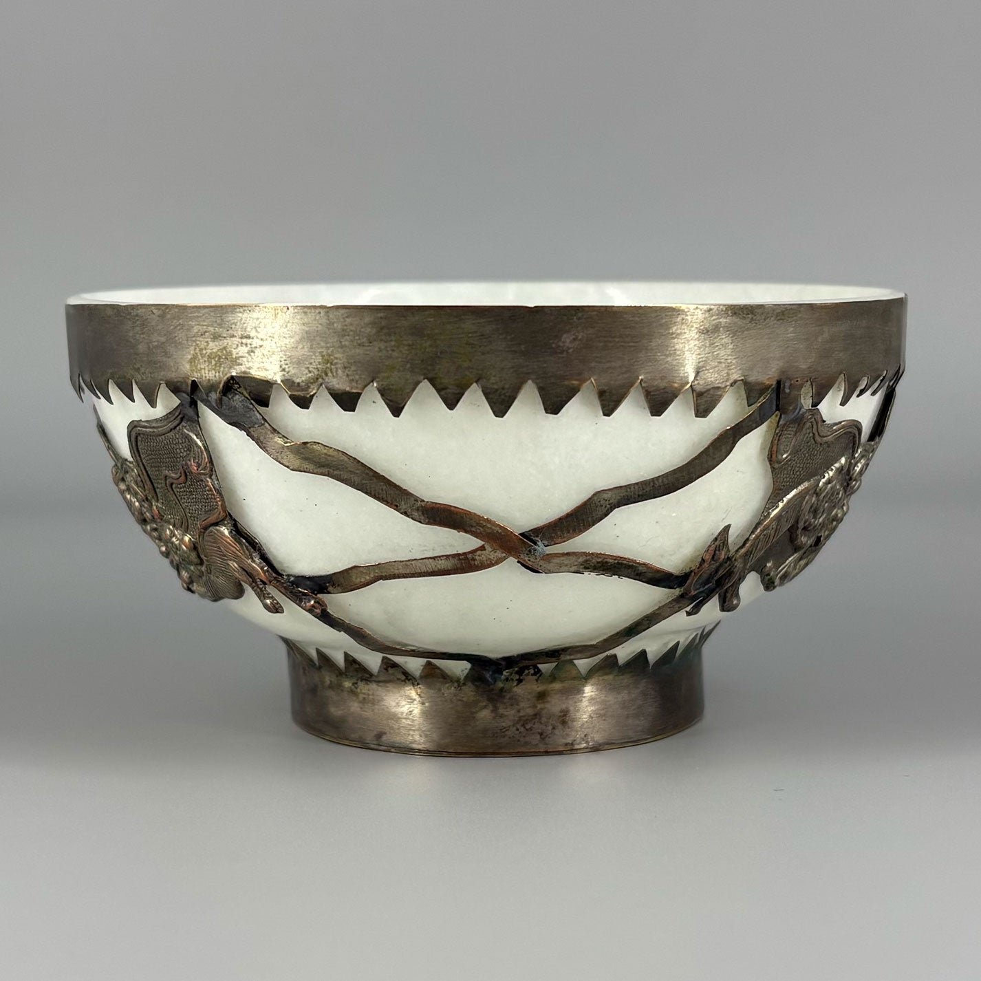 White jade bowl with brass decoration