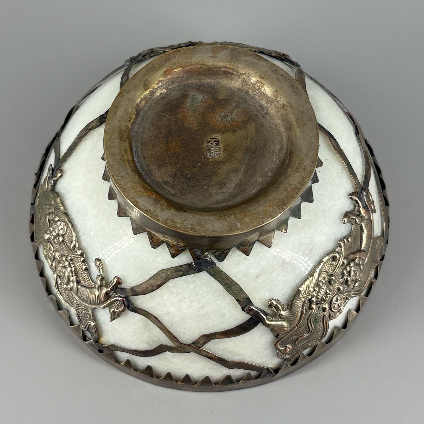 White jade bowl with brass decoration