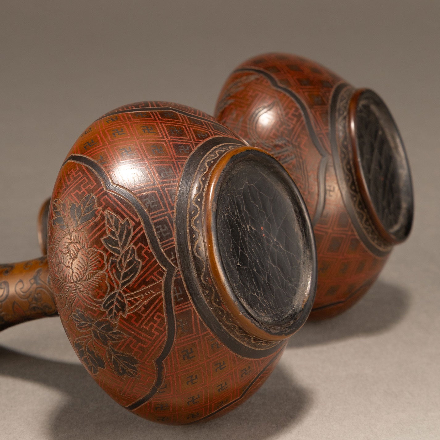 A pair of lacquer bottles