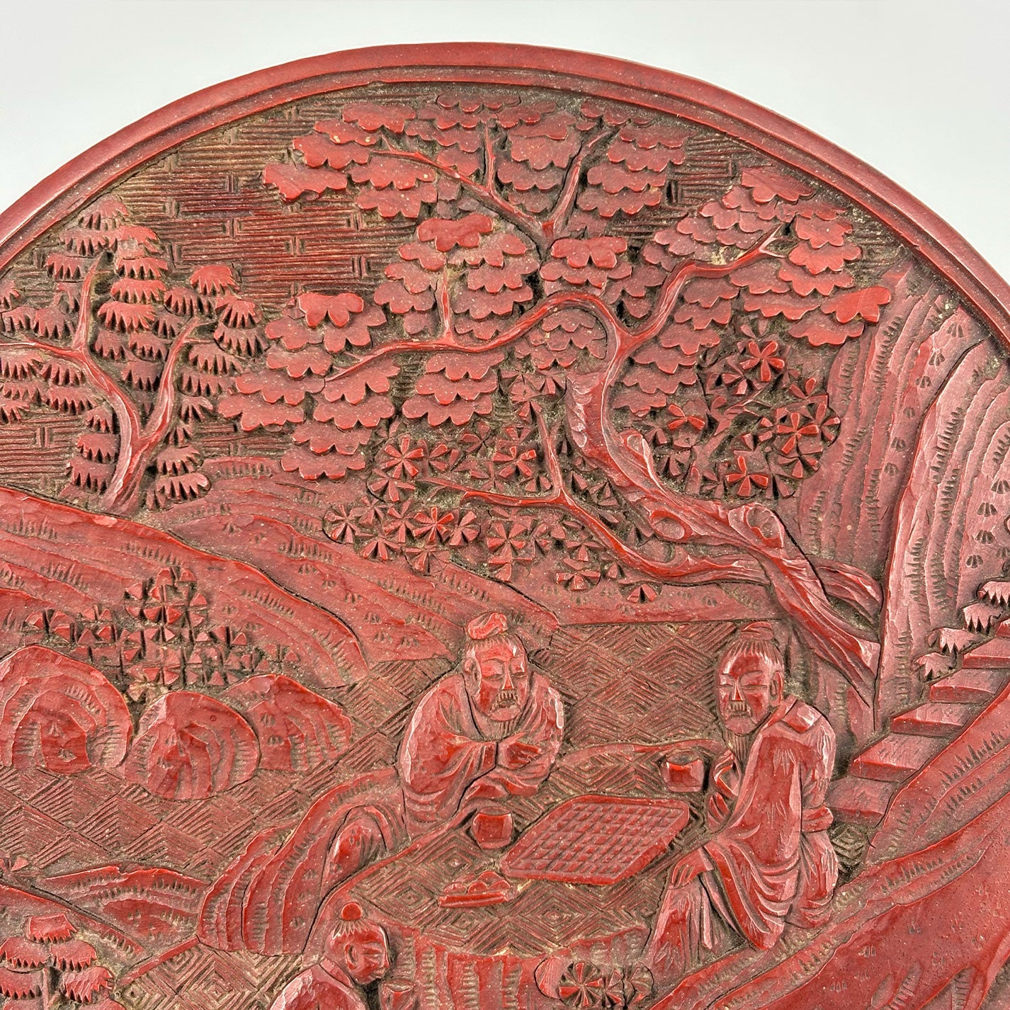 Carved Red Lacquer Box with Figure Design