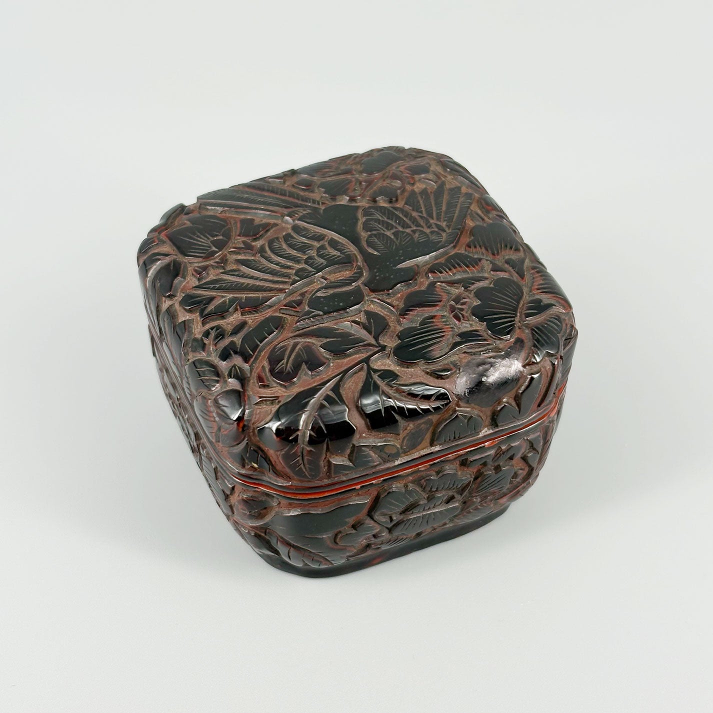 Carved Red Lacquer Incense Box with Floral and Bird Design