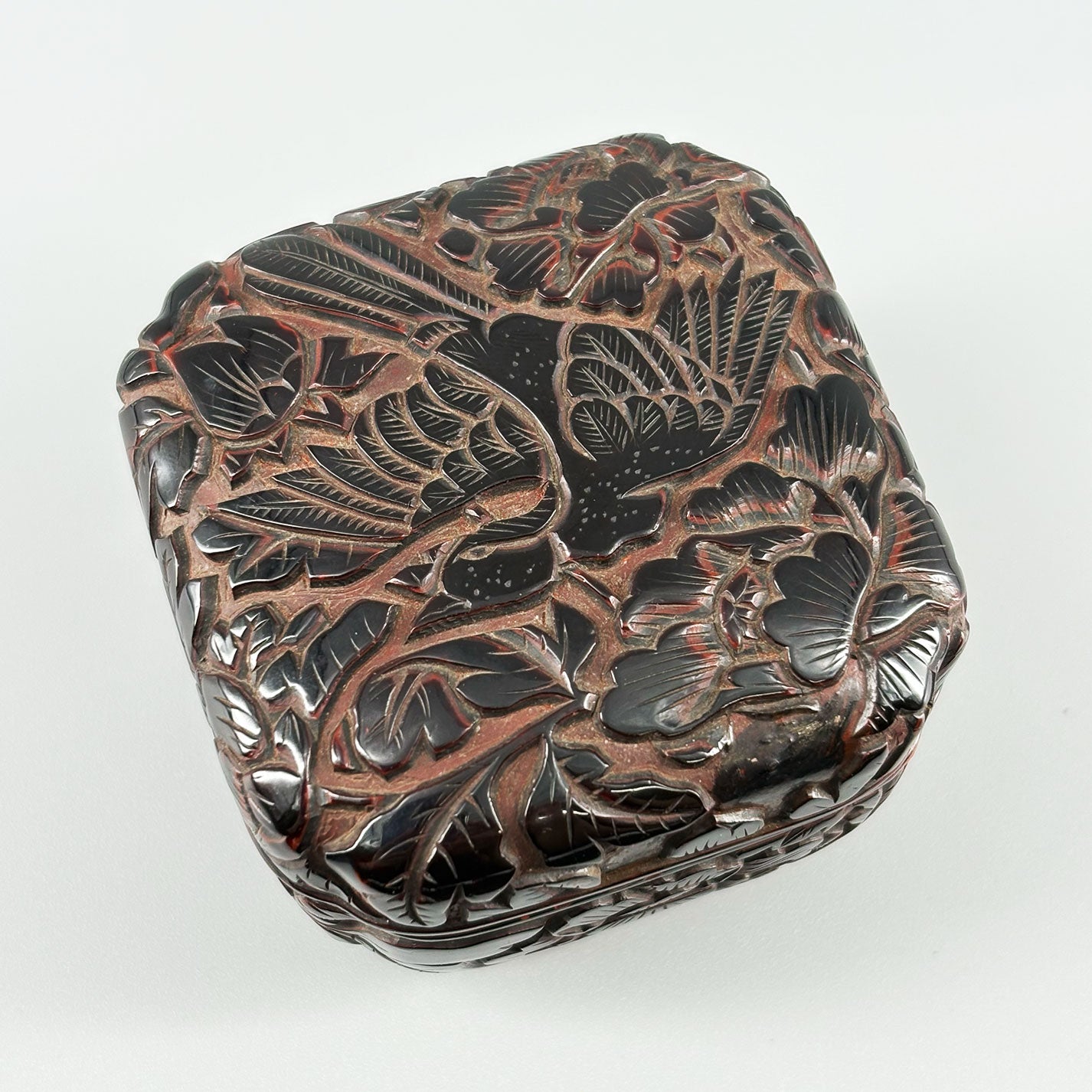 Carved Red Lacquer Incense Box with Floral and Bird Design