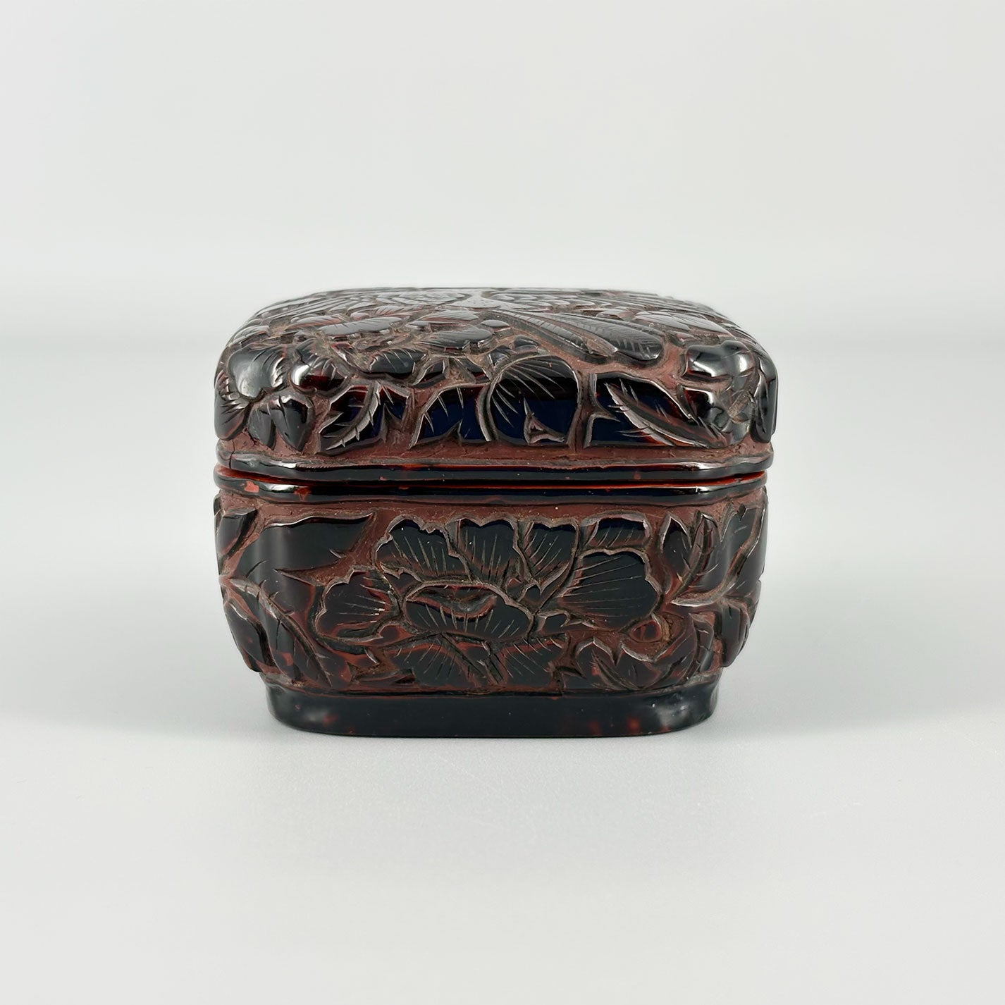 Carved Red Lacquer Incense Box with Floral and Bird Design