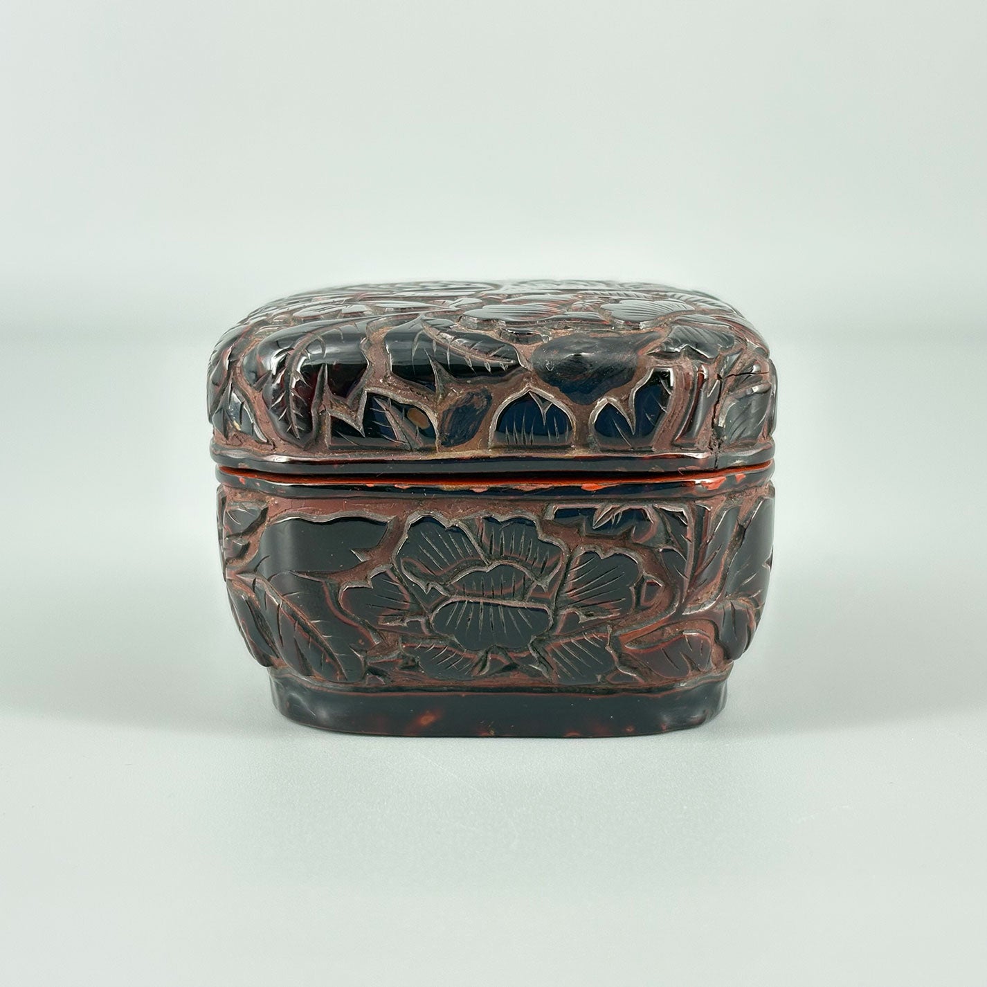 Carved Red Lacquer Incense Box with Floral and Bird Design