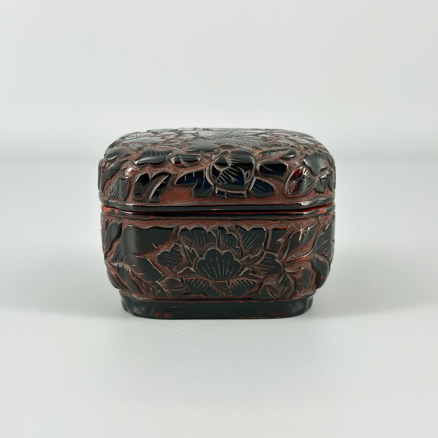 Carved Red Lacquer Incense Box with Floral and Bird Design