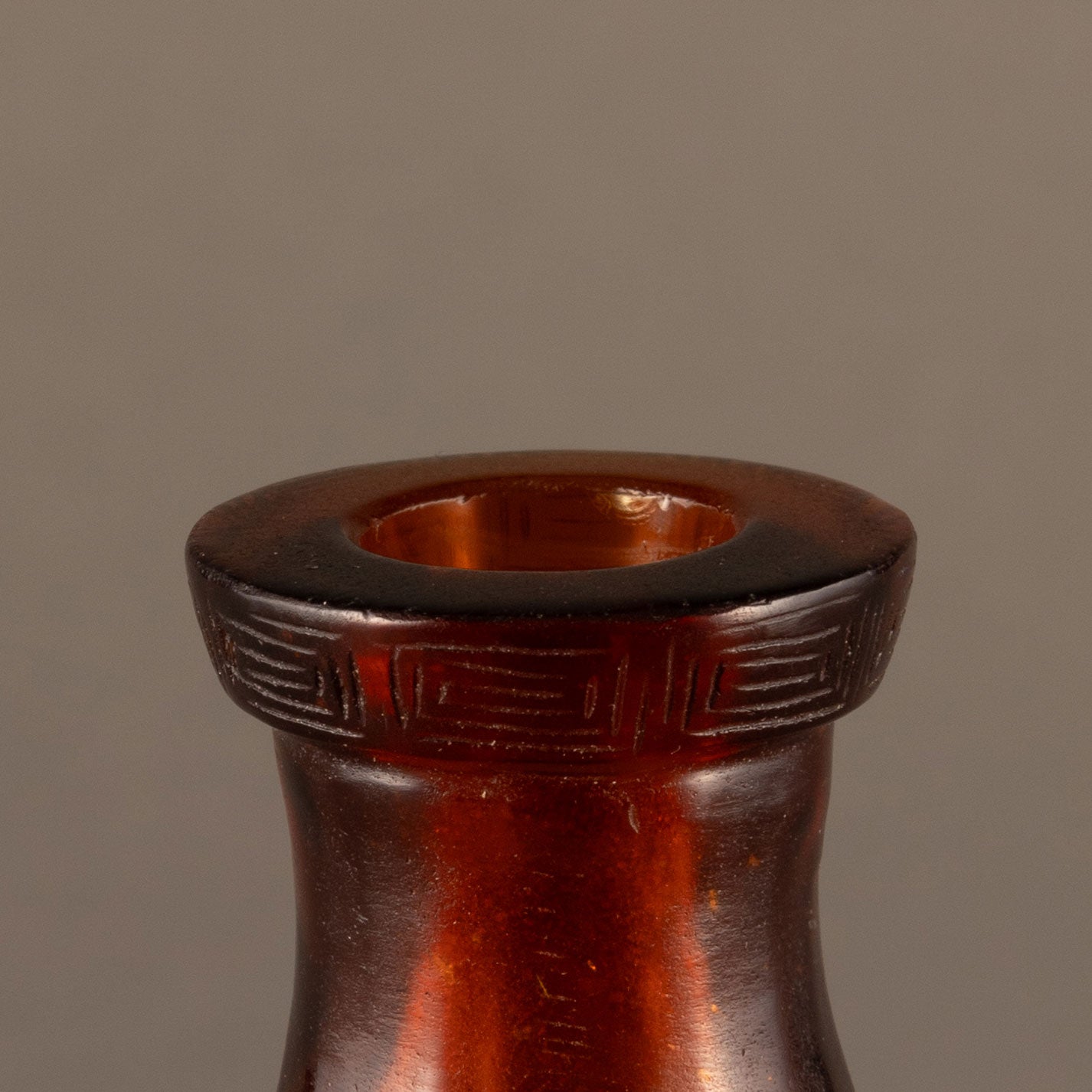Reed-shaped bottle