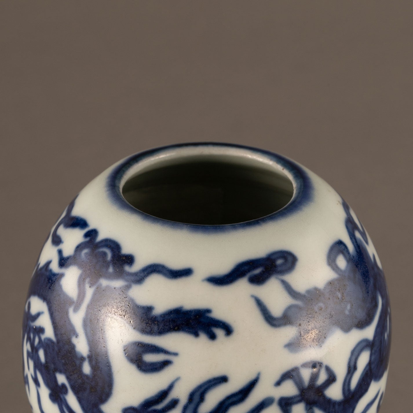 Blue and white cloud and dragon motif holly vase