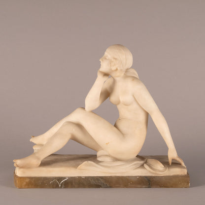 Unknown "Woman seated statue"