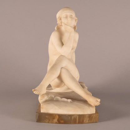 Unknown "Woman seated statue"