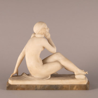 Unknown "Woman seated statue"