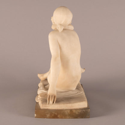 Unknown "Woman seated statue"