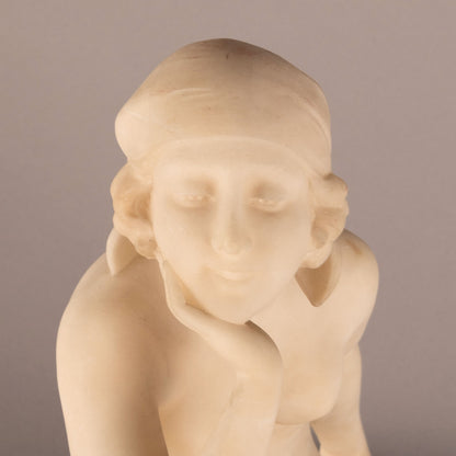 Unknown "Woman seated statue"