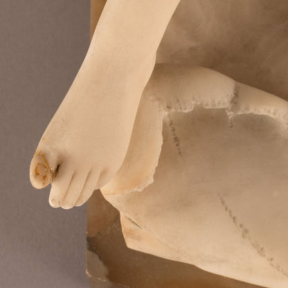 Unknown "Woman seated statue"