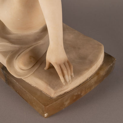 Unknown "Woman seated statue"