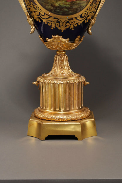 Cobalt-Glazed and Gilt Covered Urn with Madonna and Angels design