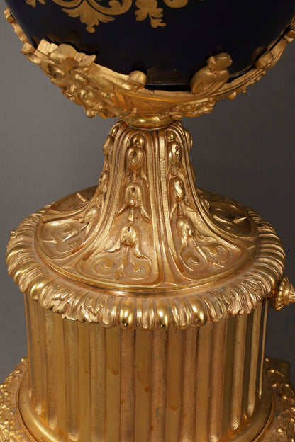 Cobalt-Glazed and Gilt Covered Urn with Madonna and Angels design