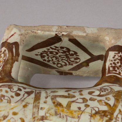 Luster-Painted Beast-Shaped Pitcher with a Human Face