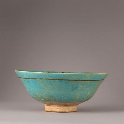 Kashan "Blue glazed with Gilt monster design bowl"