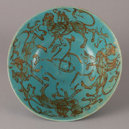 Kashan "Blue glazed with Gilt monster design bowl"