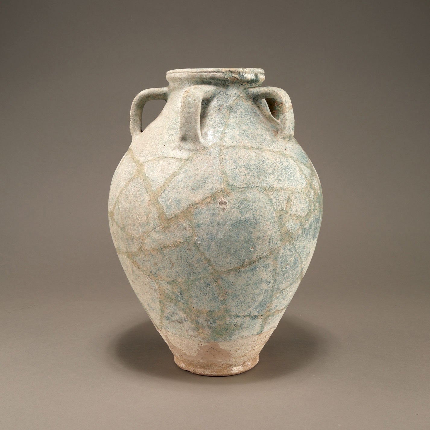 Blue-Glazed Persian Jar with Lug Handles and Silver Iridescence
