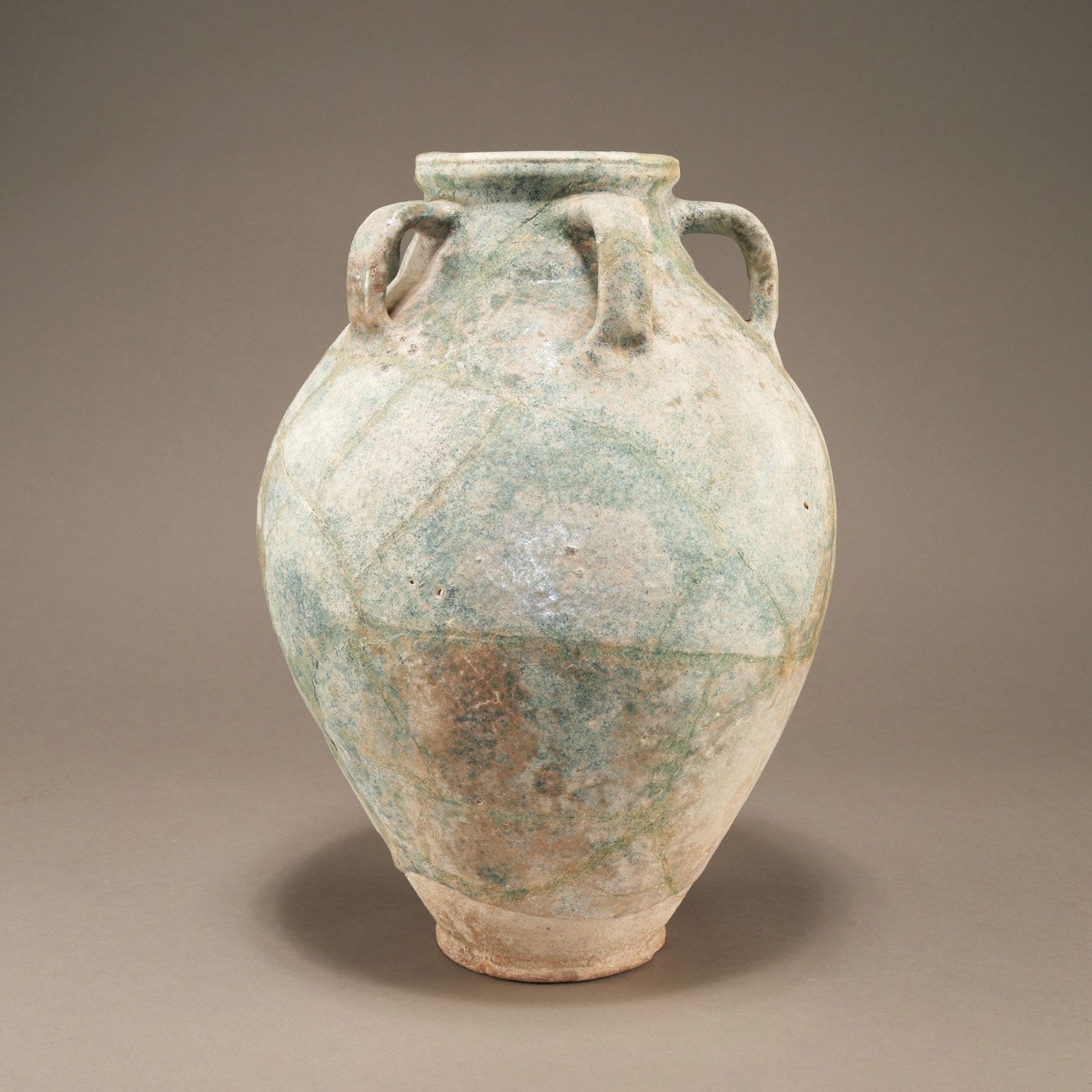 Blue-Glazed Persian Jar with Lug Handles and Silver Iridescence