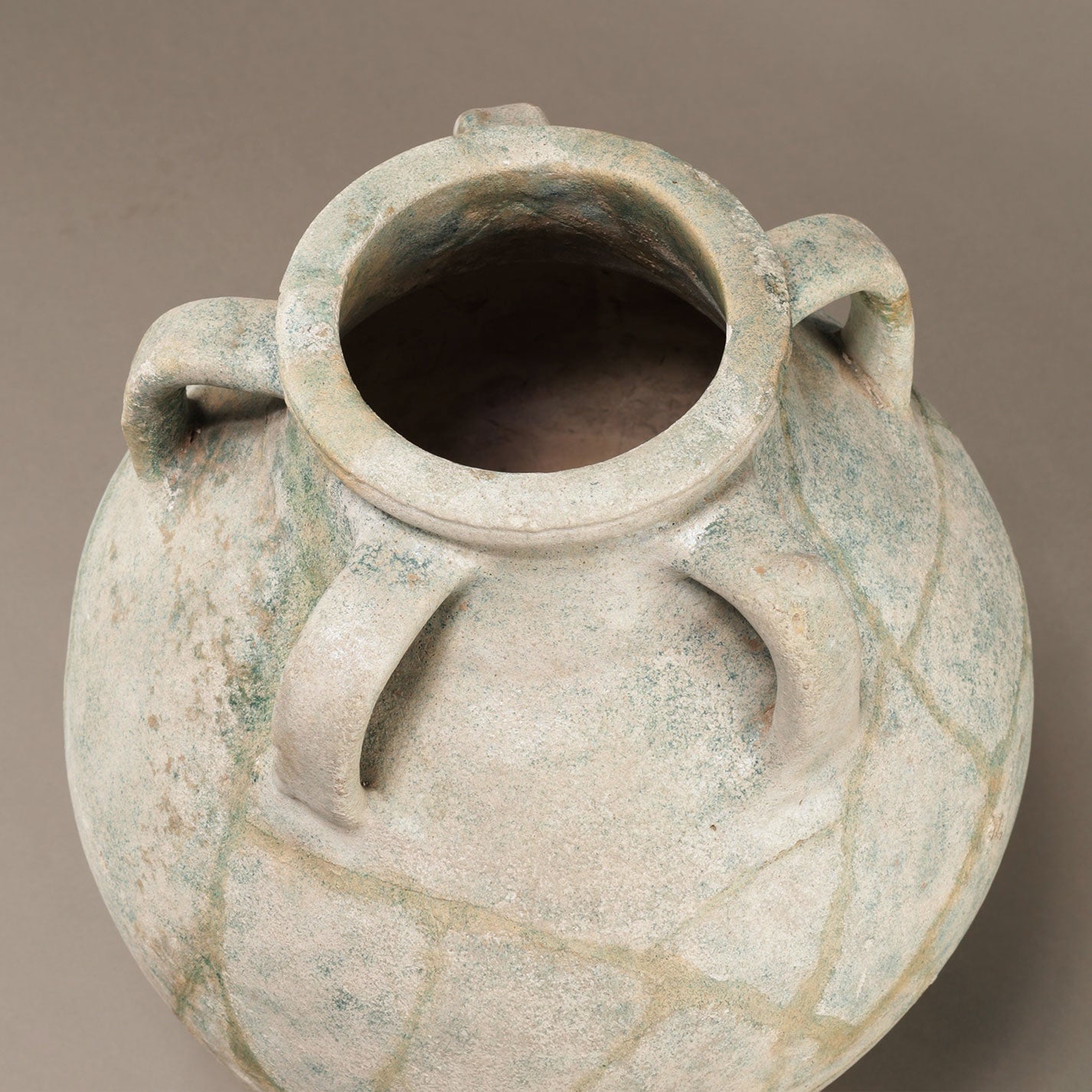 Blue-Glazed Persian Jar with Lug Handles and Silver Iridescence
