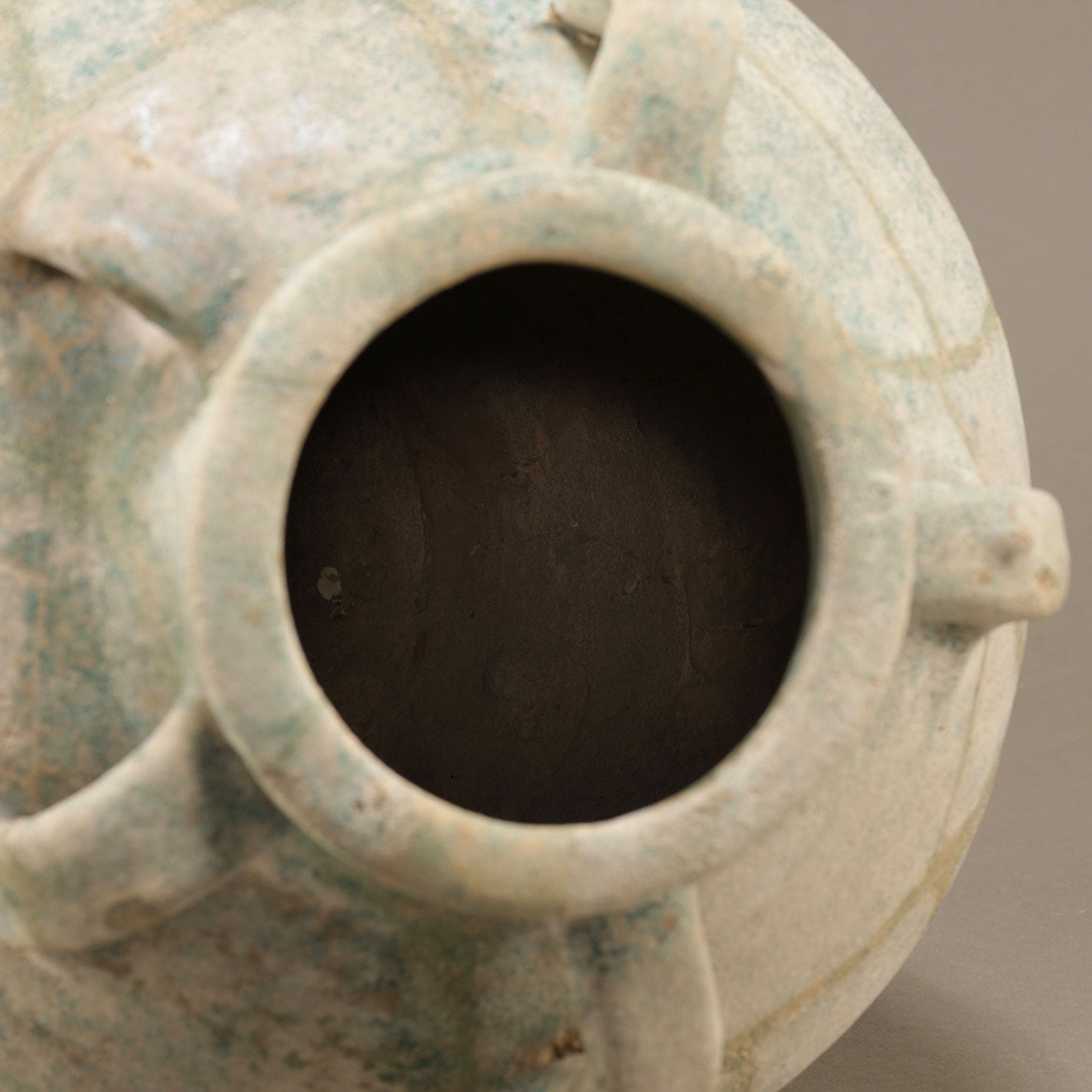 Blue-Glazed Persian Jar with Lug Handles and Silver Iridescence