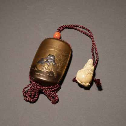 Puppy Maki-e Inrō (with Ivory Sennin Netsuke)