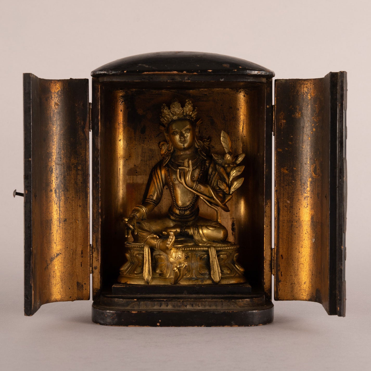 Copper-plated seated bodhisattva statue niche