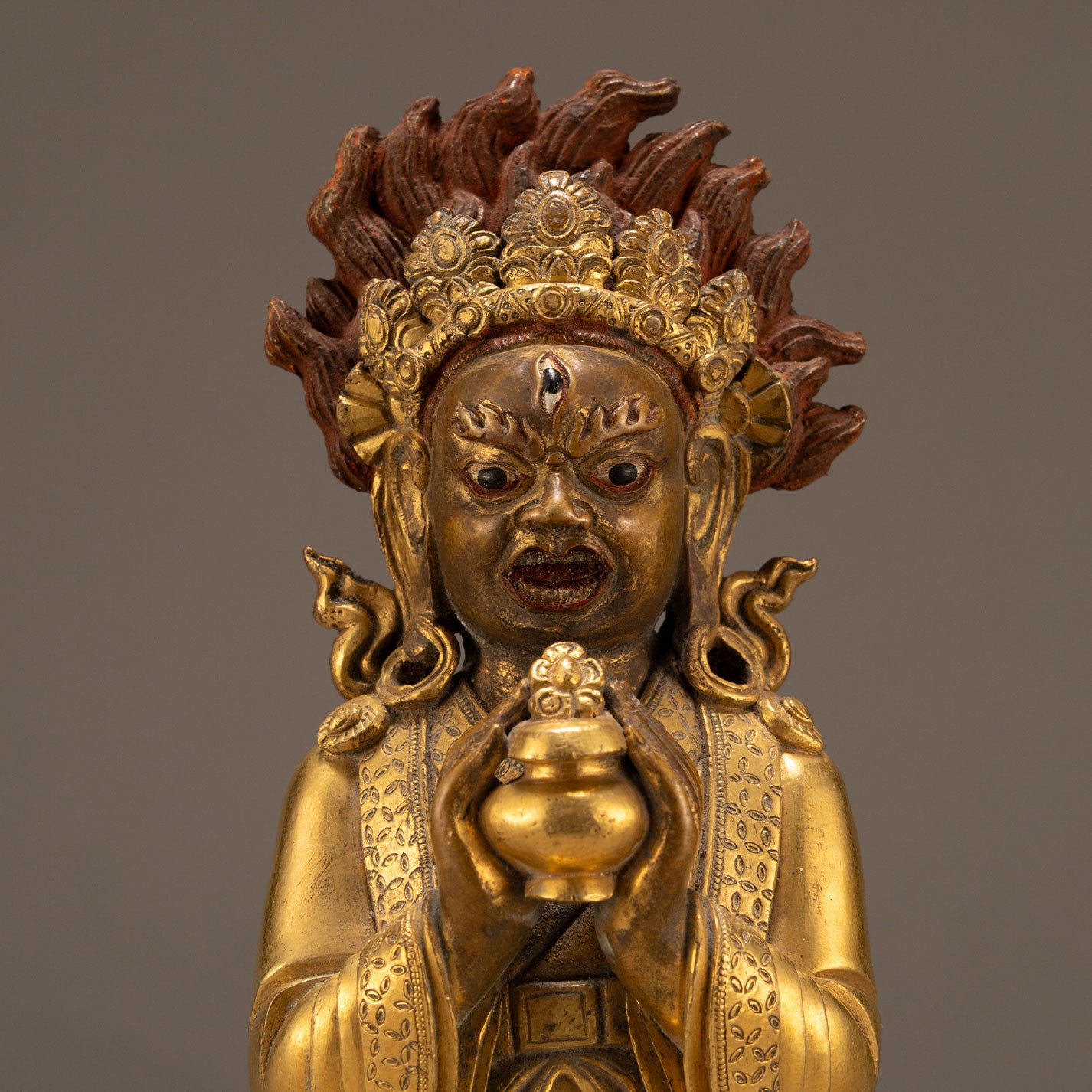 Bronze and gold statue of a guardian deity