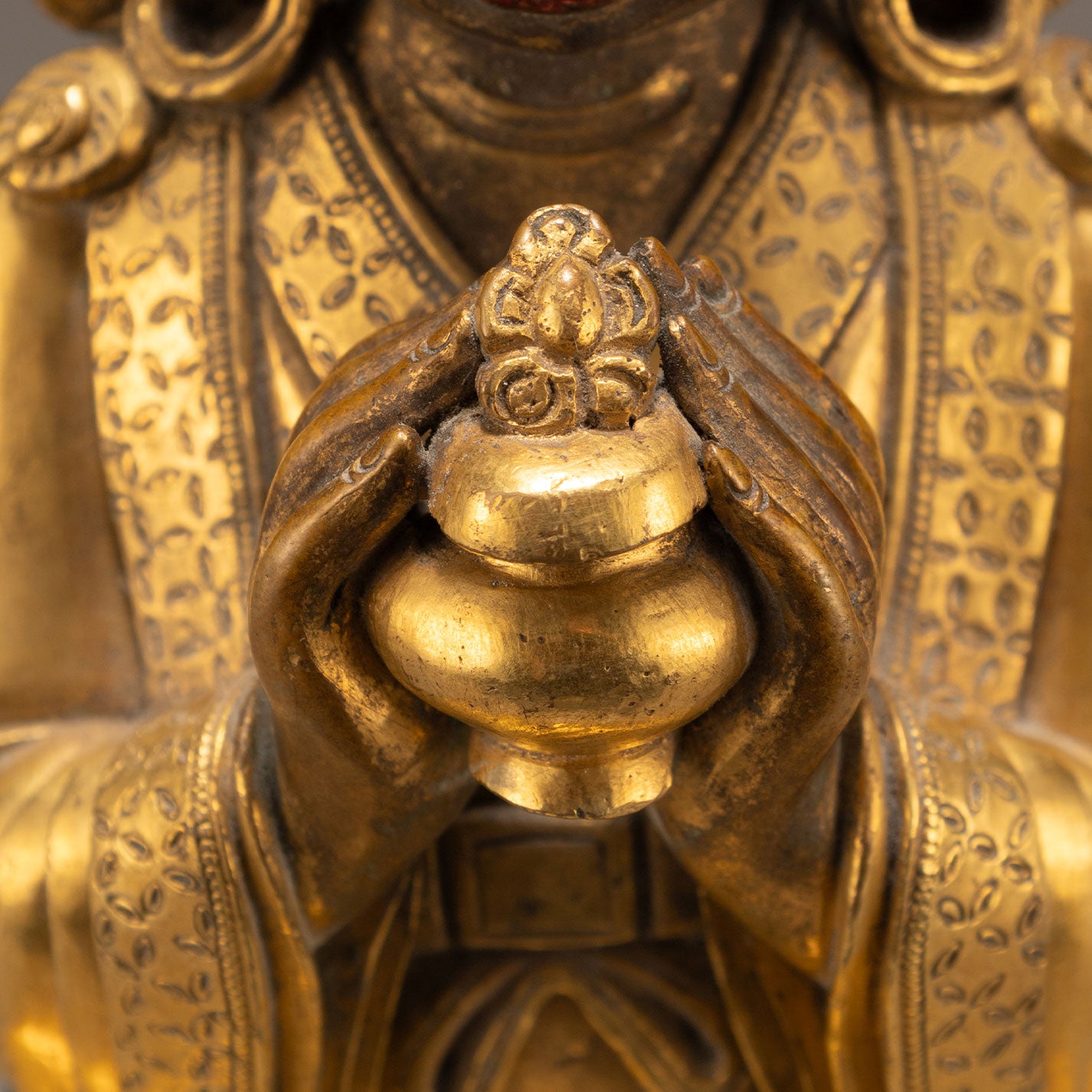 Bronze and gold statue of a guardian deity