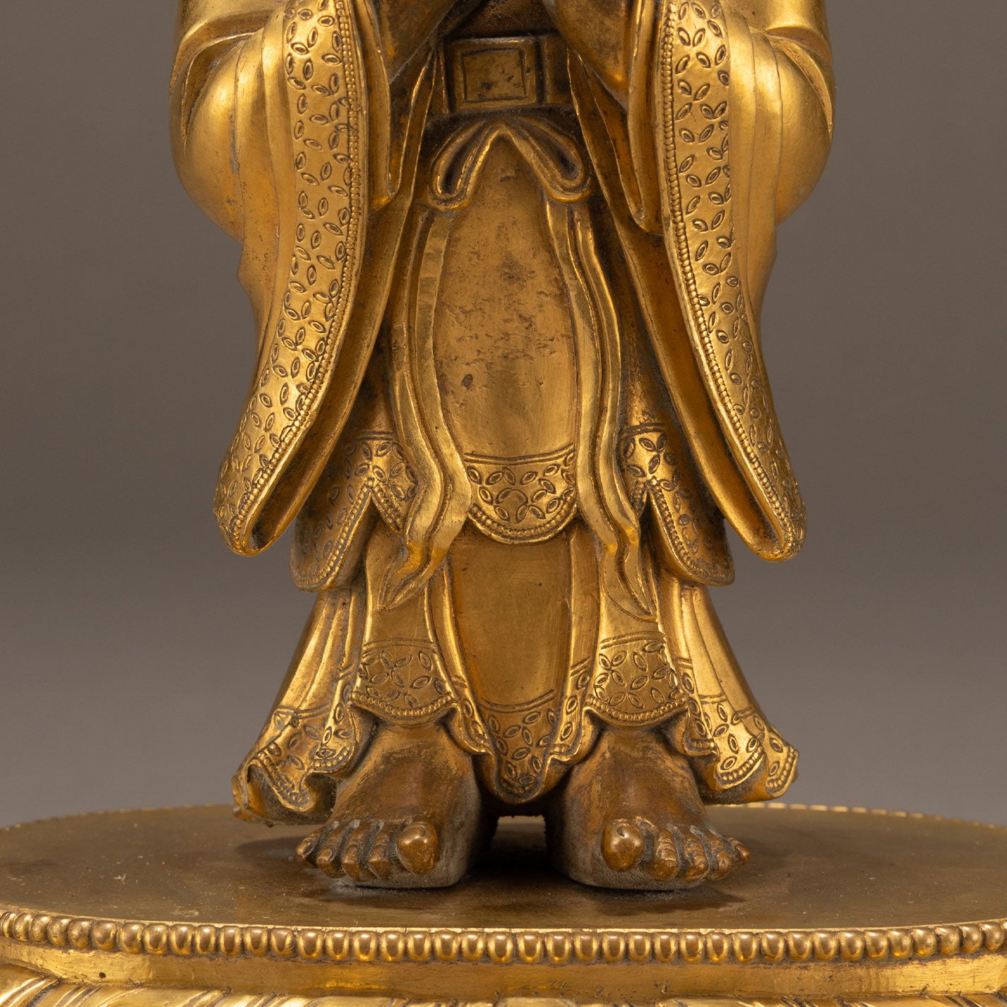 Bronze and gold statue of a guardian deity