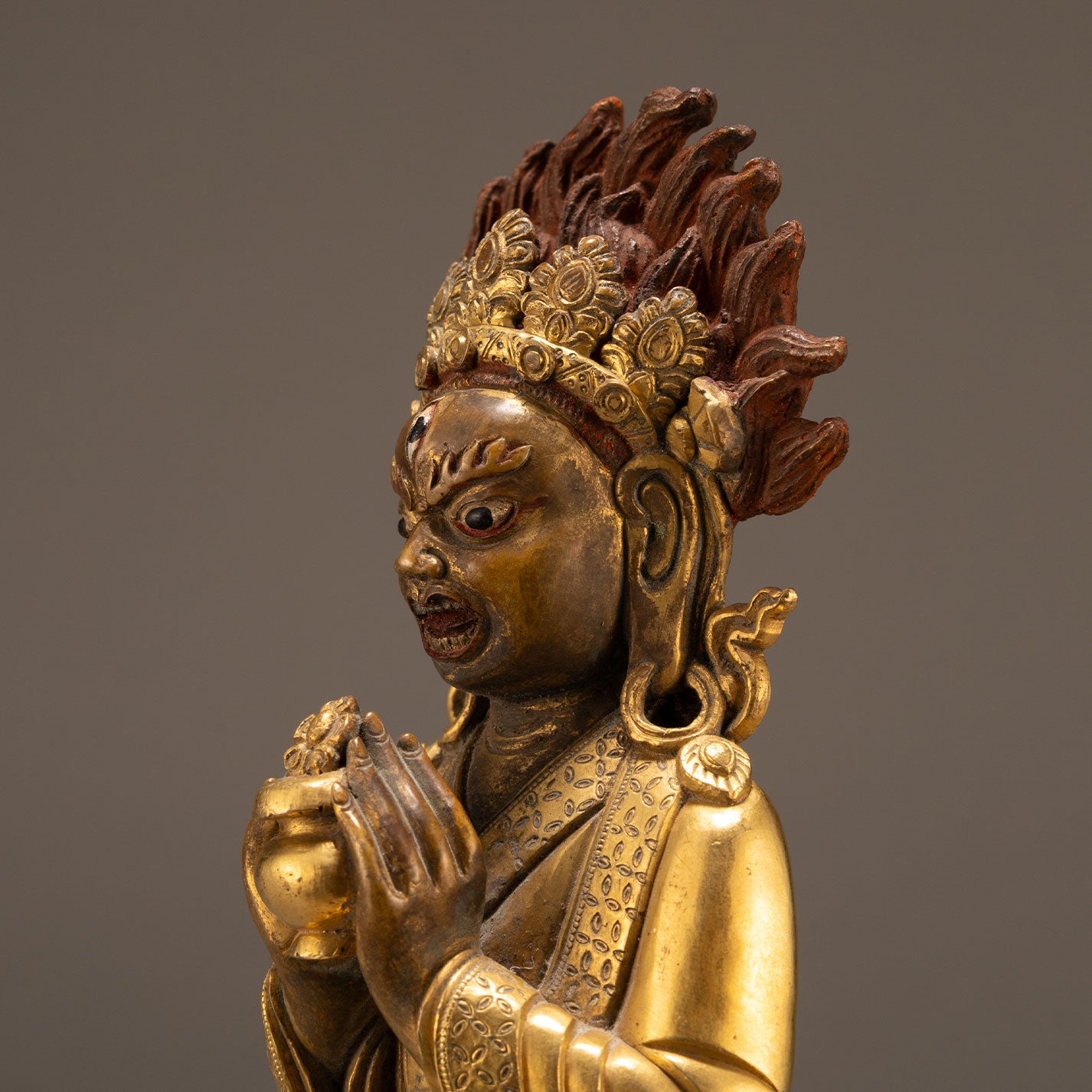 Bronze and gold statue of a guardian deity